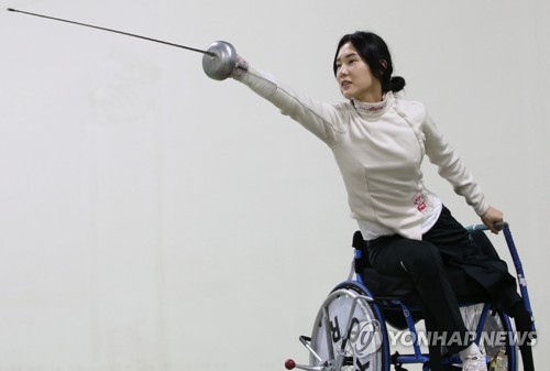 휠체어펜싱 부부 김선미·박천희 장애 넘어 도쿄 향해 찌른다
