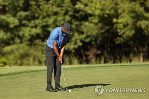 '냉찜질'에 떠오른 부상주의보…우즈 오일 때문에 뜨거워서