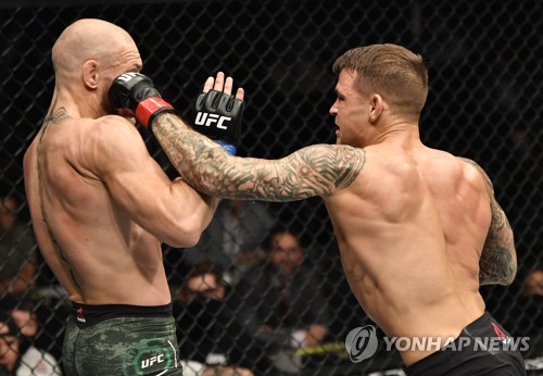 저무는 UFC 맥그리거 시대…포이리에에 생애 첫 TKO패